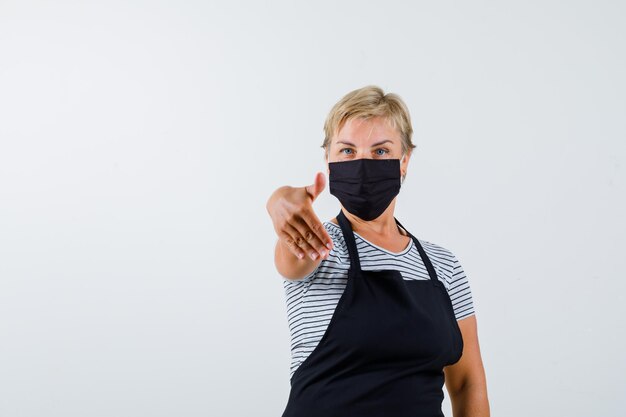 Mature woman posing in the studio