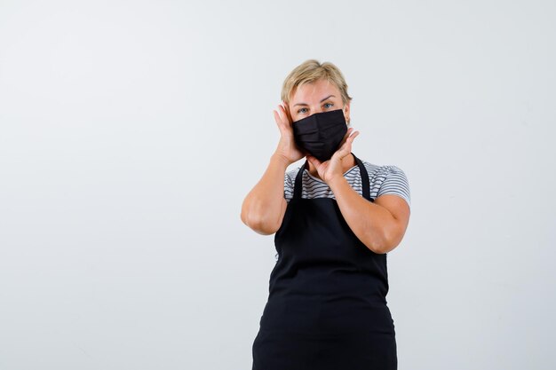 Mature woman posing in the studio