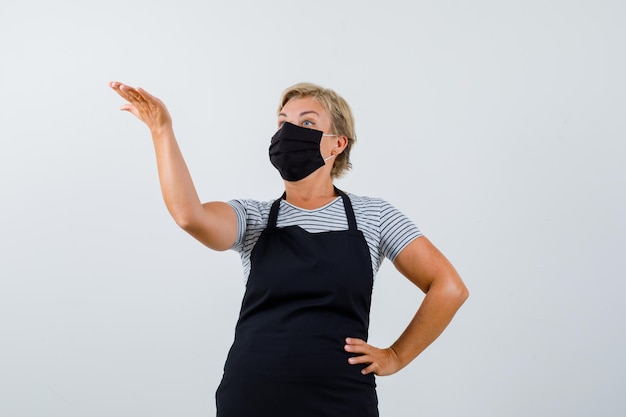 Mature woman posing in the studio