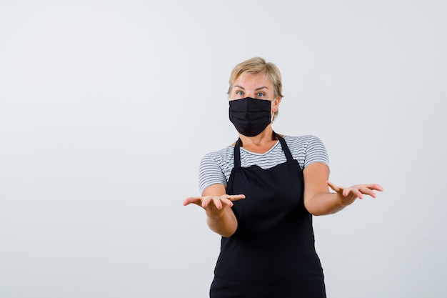 Mature woman posing in the studio