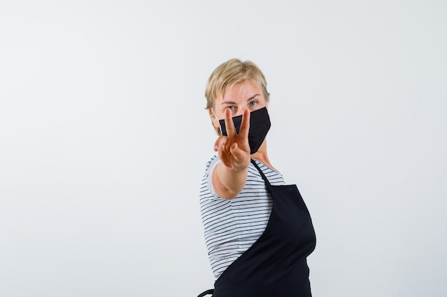 Mature woman posing in the studio