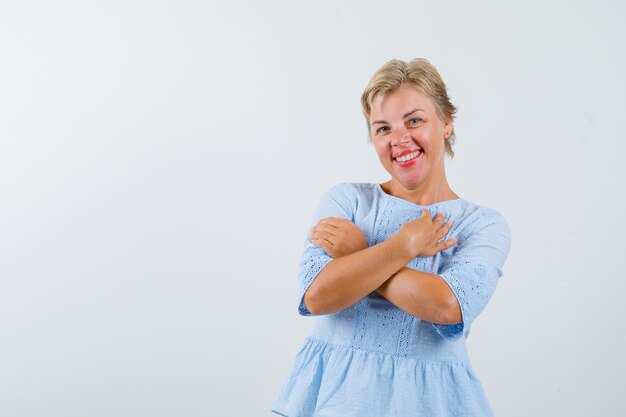 Mature woman posing in the studio