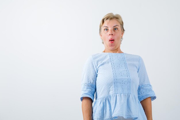 Mature woman posing in the studio