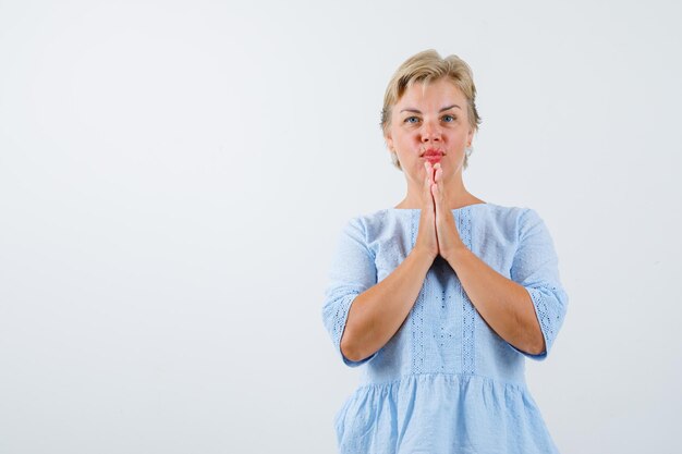 Mature woman posing in the studio