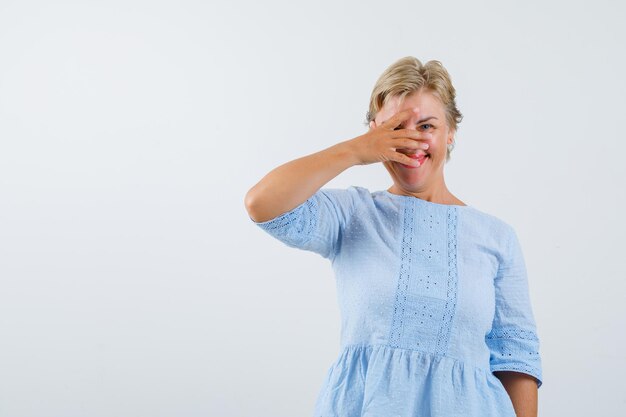 Mature woman posing in the studio