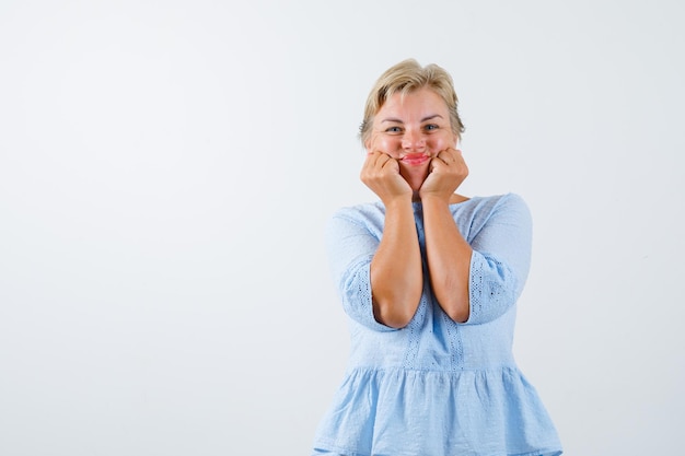 Free photo mature woman posing in the studio