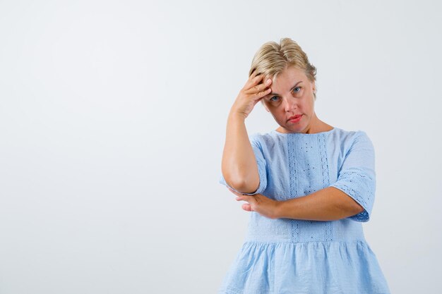 Mature woman posing in the studio