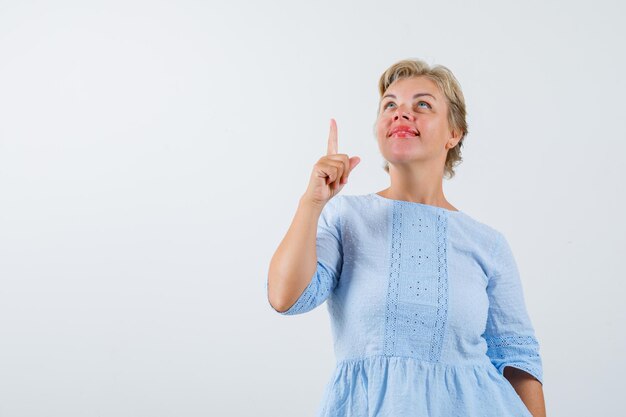 Mature woman posing in the studio