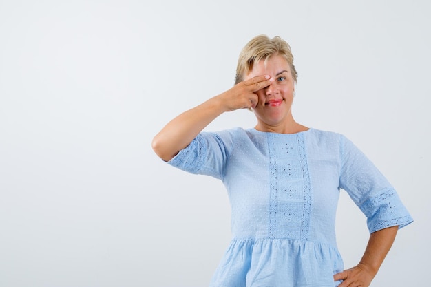 Mature woman posing in the studio