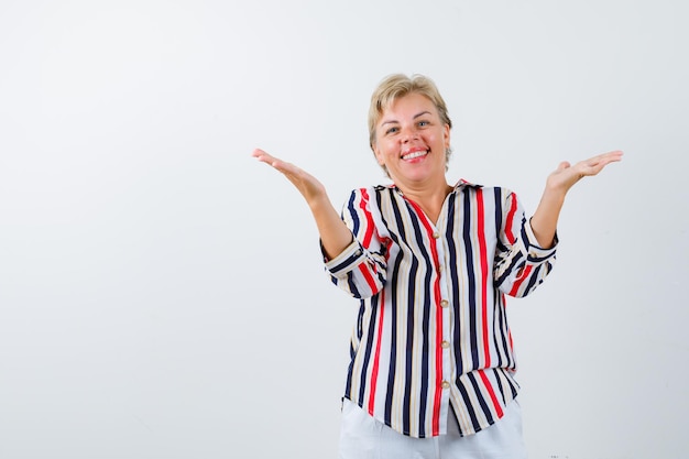 Mature woman posing in the studio