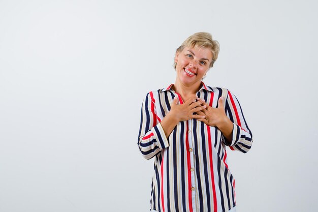 Mature woman posing in the studio