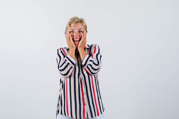 Mature woman posing in the studio