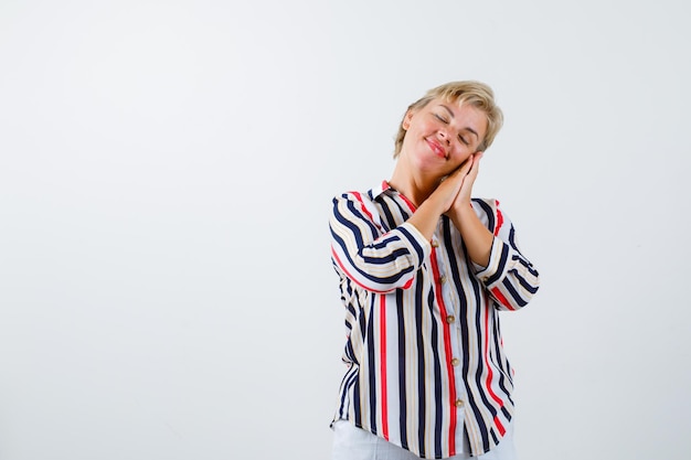 Mature woman posing in the studio