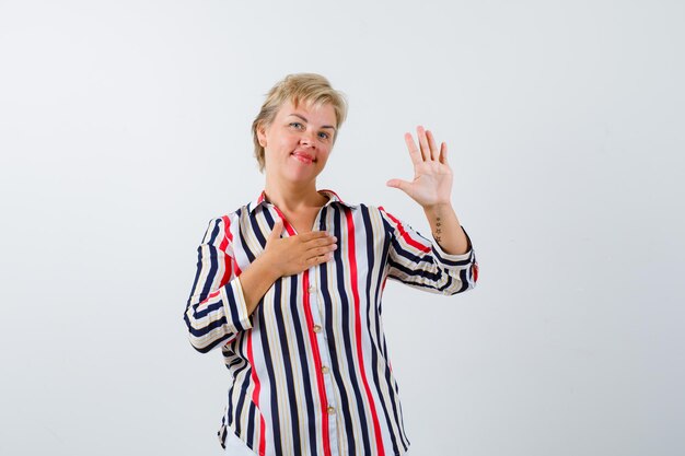 Mature woman in a vertical-striped shirt