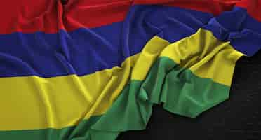 Free photo mauritius flag wrinkled on dark background 3d render