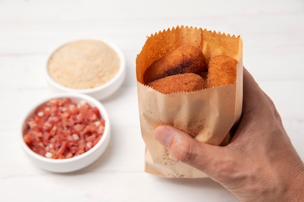 Free photo meal containing croquettes and bacon