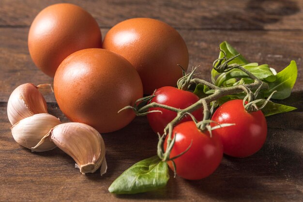 Meal ingredients on wooden background