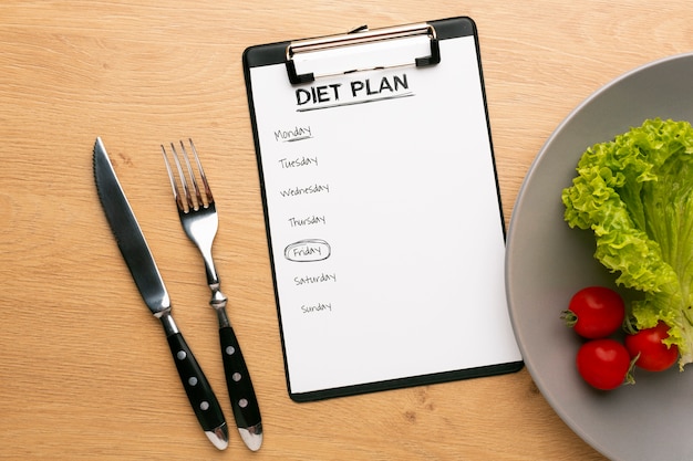 Meal planning clipboard and food arrangement