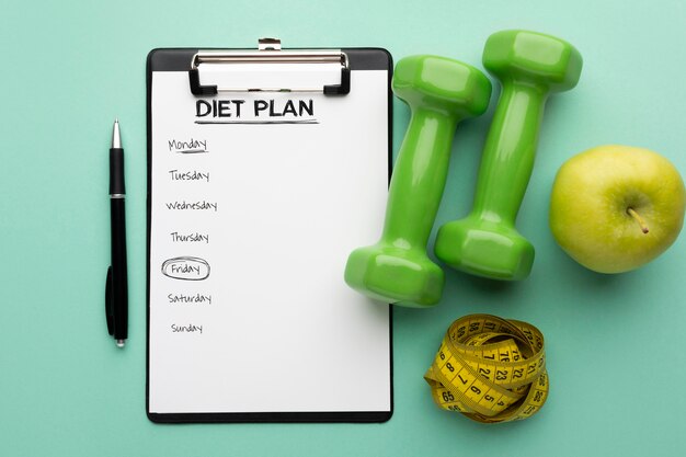 Meal planning clipboard and food arrangement