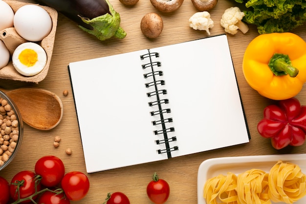 Meal planning notepad and food arrangement