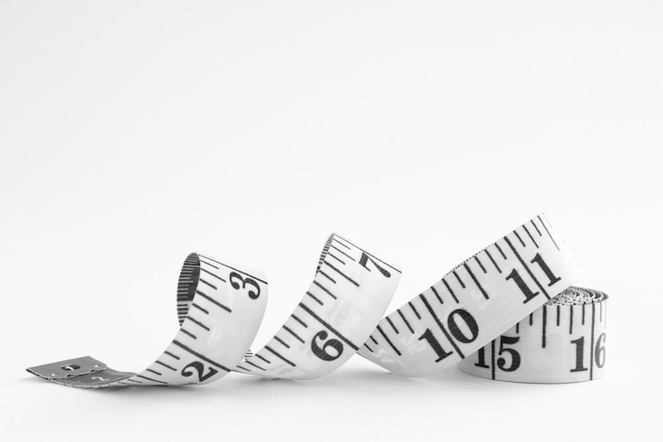 Free Photo measuring tape still life