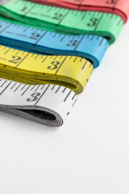 Measuring tapes arrangement still life