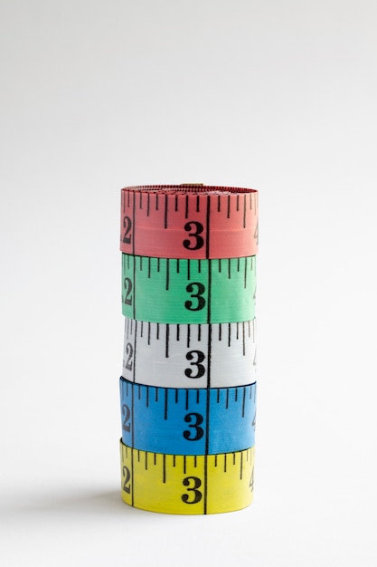 Free photo measuring tapes arrangement still life