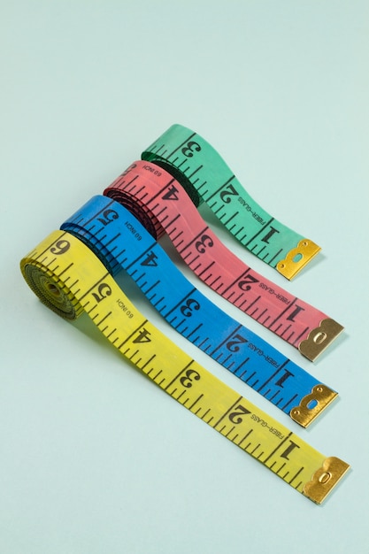 Free photo measuring tapes arrangement still life