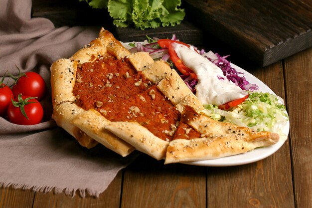Meat pide on the table