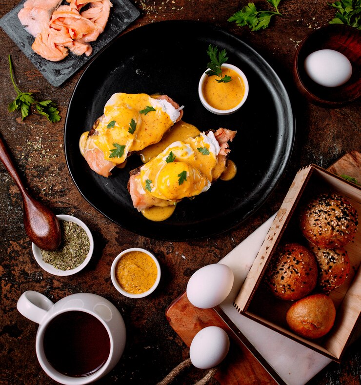 Free Photo meat topped with sauce and some eggs