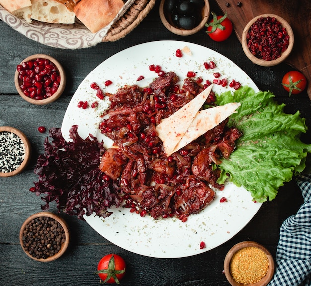 Meat with lavash and pomegranate