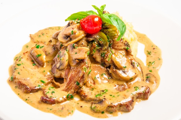 Meat with mushroom cream sauce