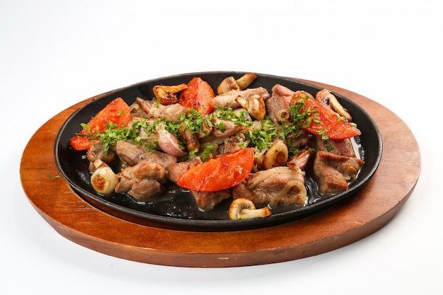 Meat with mushrooms and vegetables