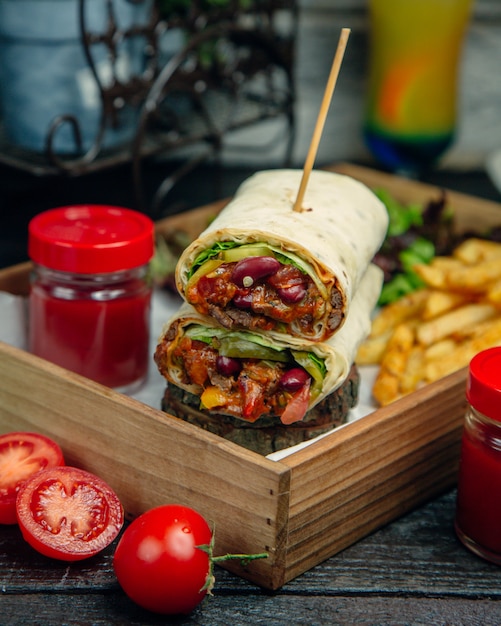 Free photo meat wrap with ketchup and fries