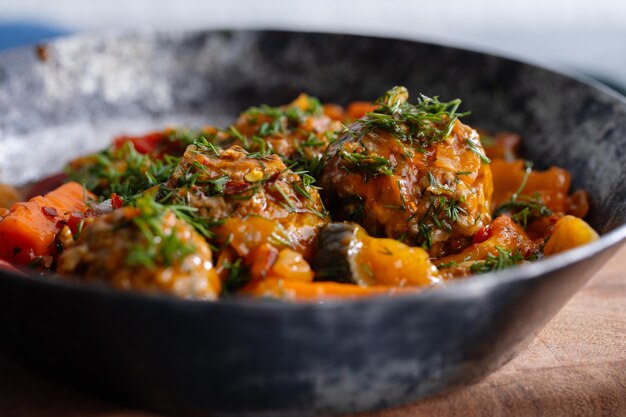 Meatballs with vegetables and tomato sauce