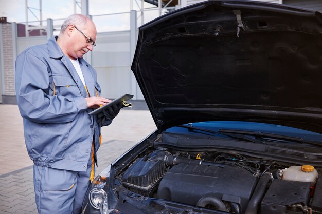 Mechanic checking a car