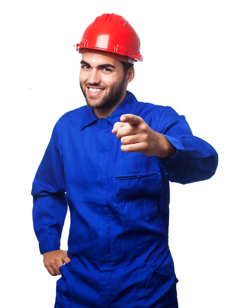 Mechanic pointing with a helmet