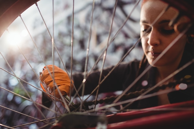 Mechanic repairing a bicycle