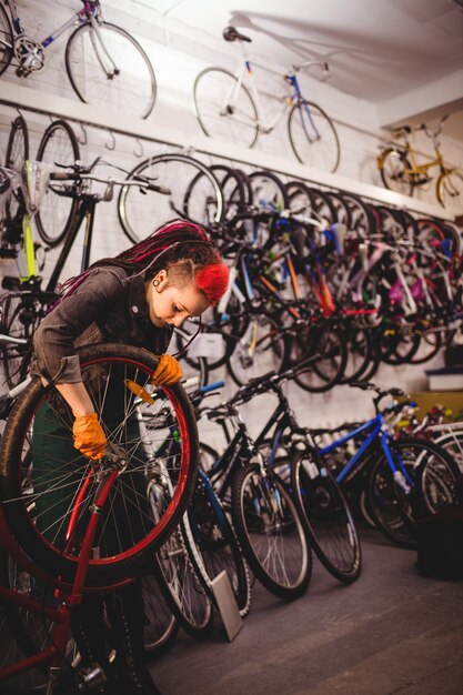 Mechanic repairing a bicycle