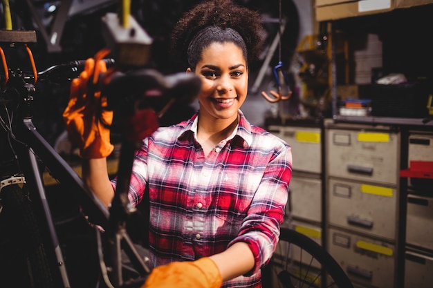 Mechanic repairing a bicycle