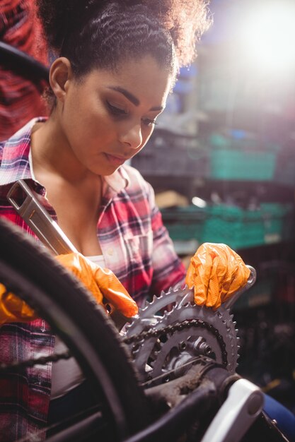 Mechanic repairing a bicycle