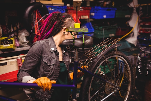 Mechanic repairing a bicycle