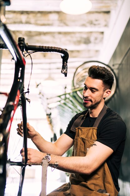 Mechanic repairing a bicycle