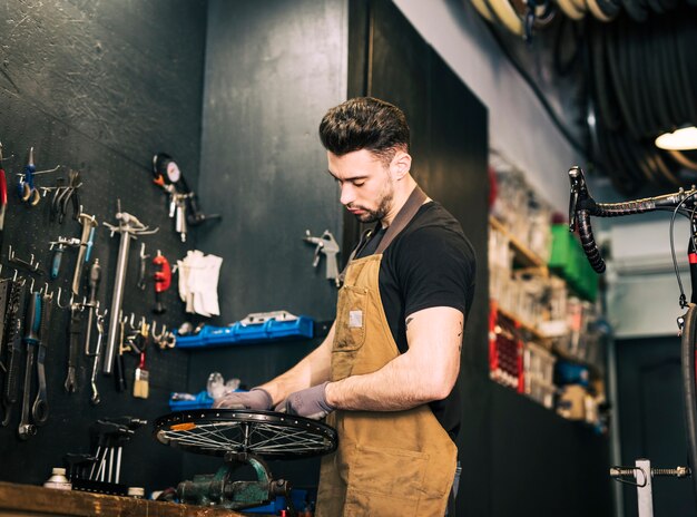 Mechanic repairing a bicycle