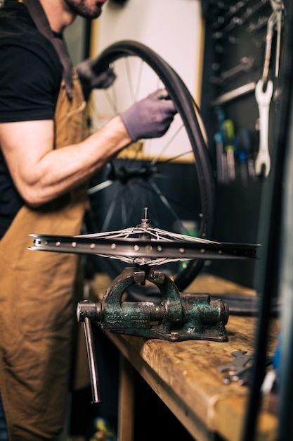 Mechanic repairing a bicycle