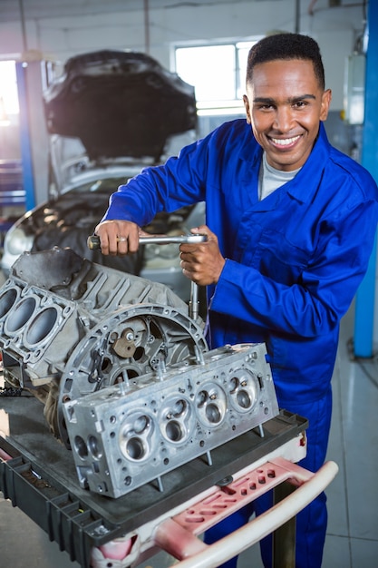 Mechanic repairing a car parts