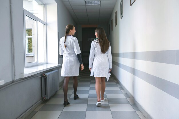 Medic women walking in hallway