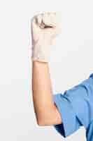 Free photo medical gloves showing a fist