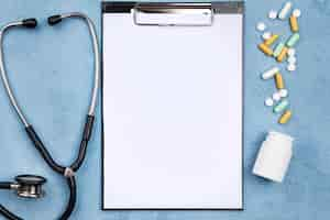 Free photo medical objects composition with empty clipboard