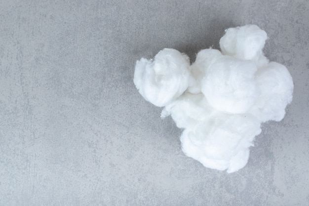 Medical soft cotton wool on a gray surface